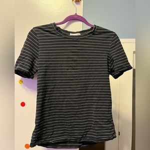Selling: Black and white striped t-shirt. Size small.